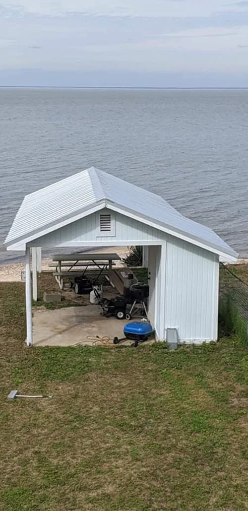 Covered carport with a new roof